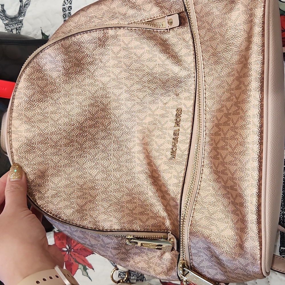 Michael kors rose gold backpack